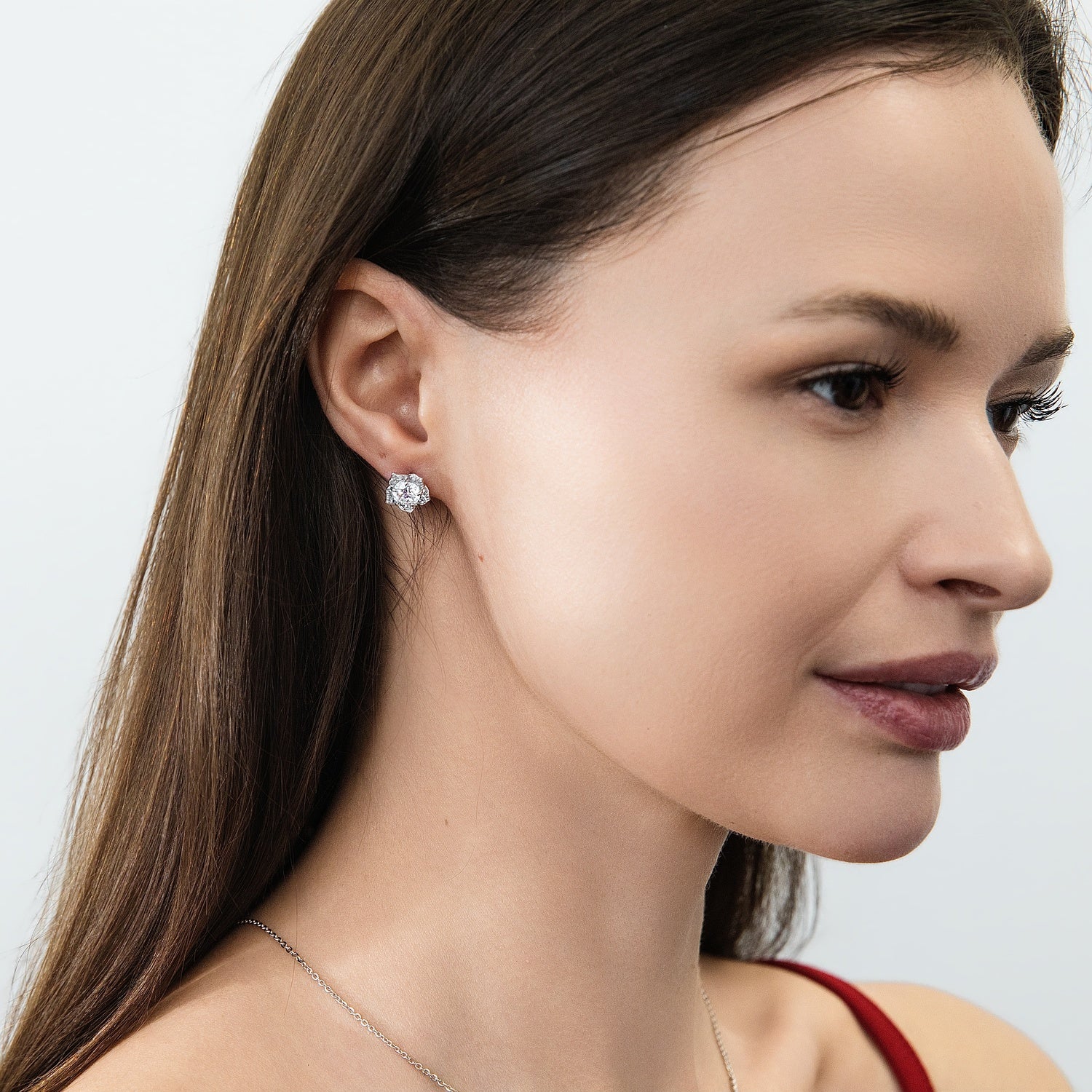 Model wearing Flower Halo CZ Stud Earrings in Sterling Silver, 2 of 8