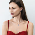 Model wearing Snake CZ Stud Earrings in Sterling Silver, Rhodium Plated