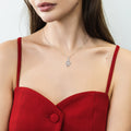 Model wearing Snake CZ Pendant Necklace in Sterling Silver, Rhodium Plated