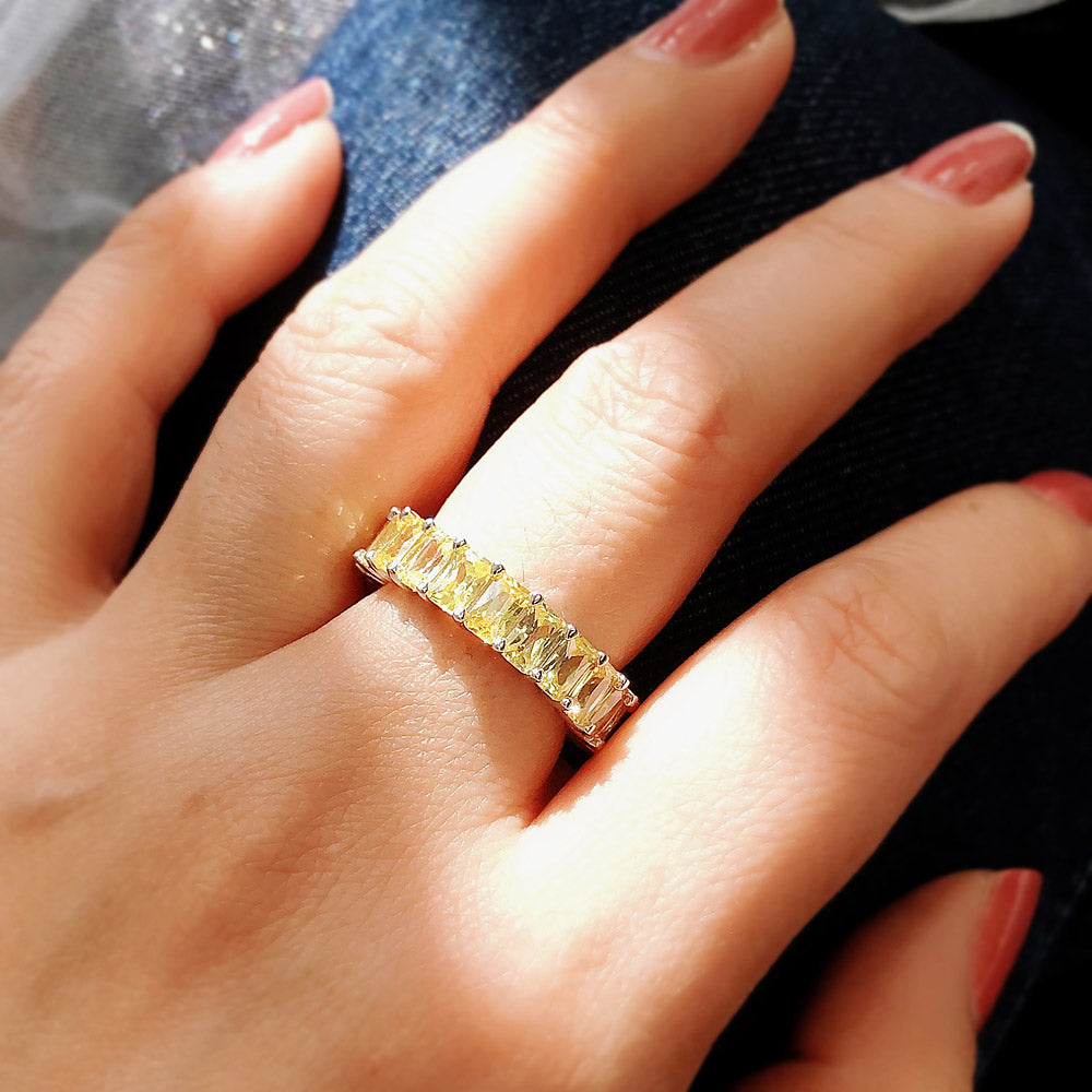 Model wearing Canary Yellow Pave Radiant CZ Eternity Ring in Sterling Silver, 6 of 11