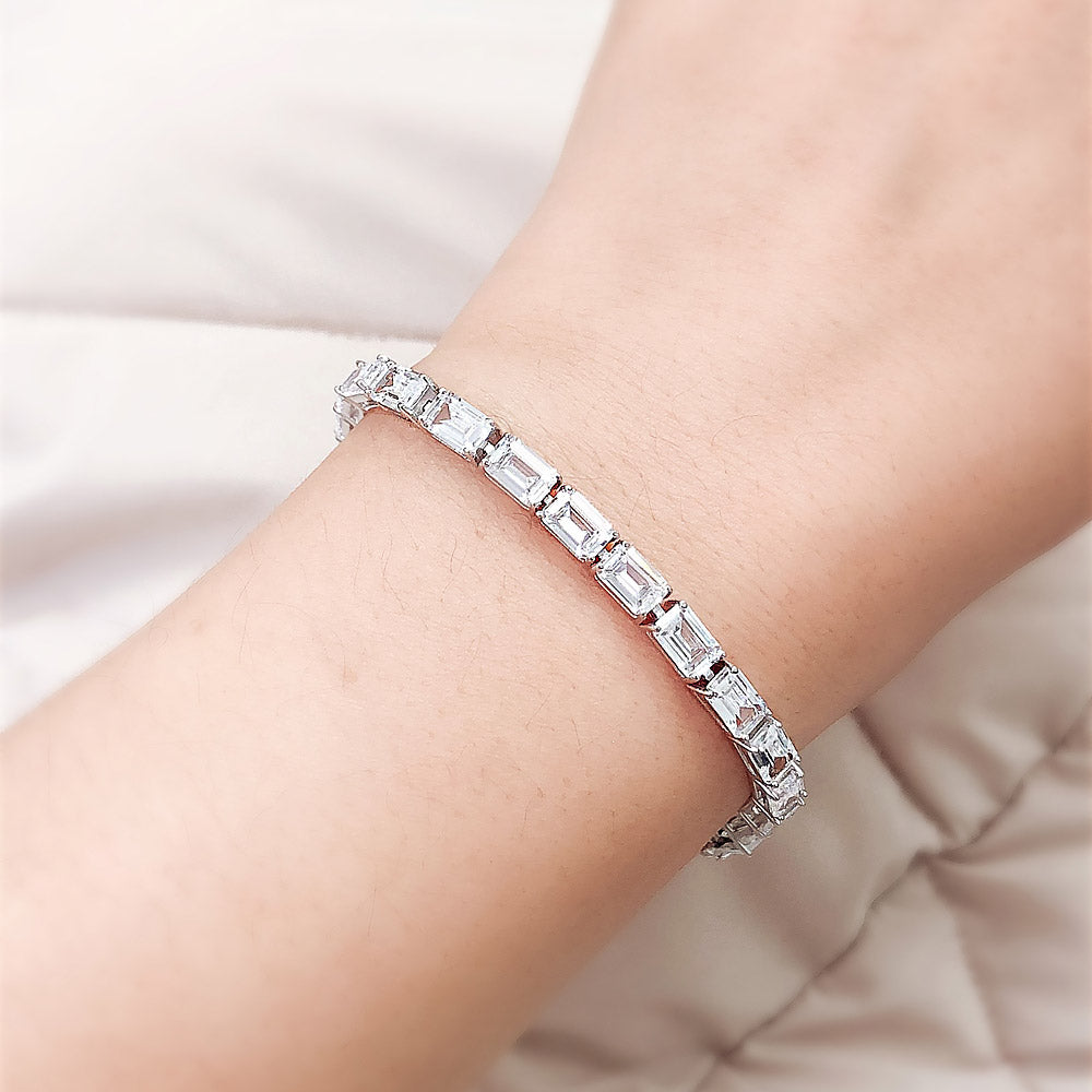 Model wearing Emerald Cut CZ Tennis Bracelet in Sterling Silver, 6 of 8