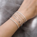 Model wearing Figaro Chain Bracelet in Sterling Silver, Yellow Gold Flashed