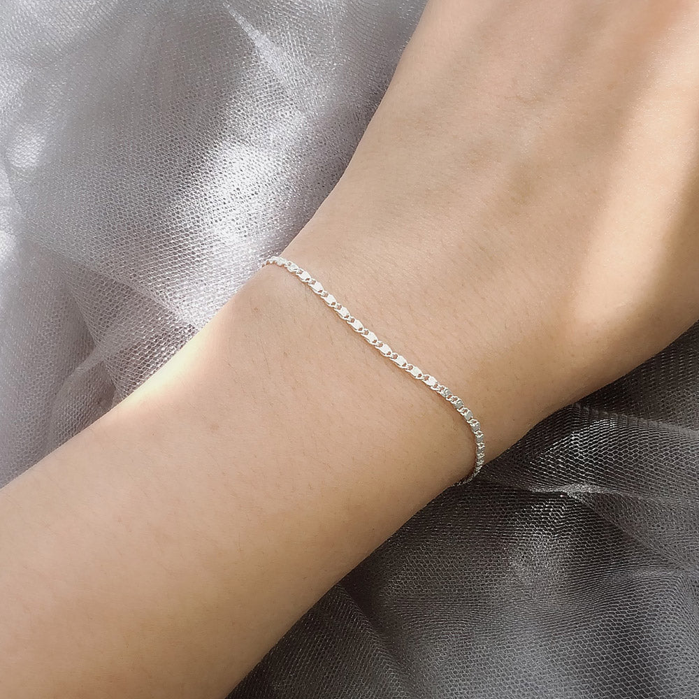 Model wearing Chain Bracelet in Sterling Silver, Yellow Gold Flashed