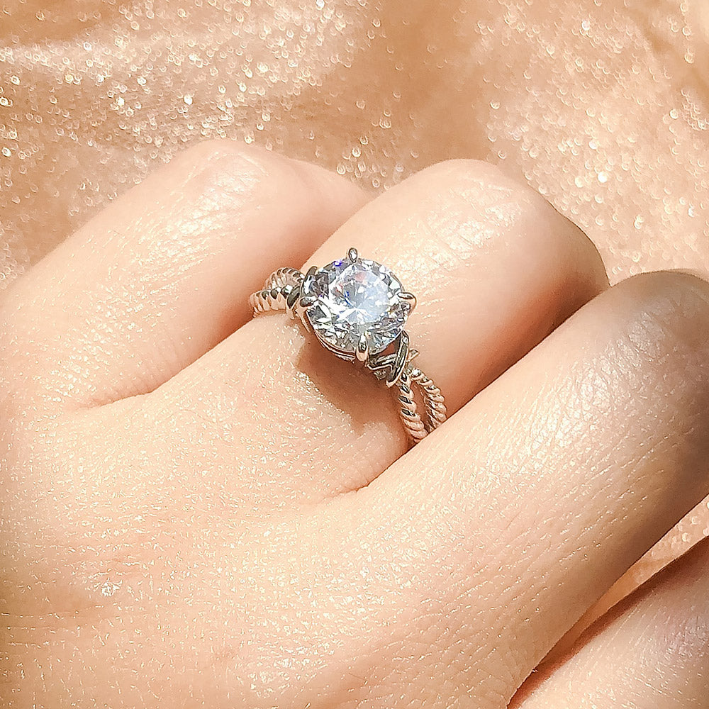 Model wearing Cable Woven Solitaire 2ct CZ Ring in Sterling Silver, 7 of 12