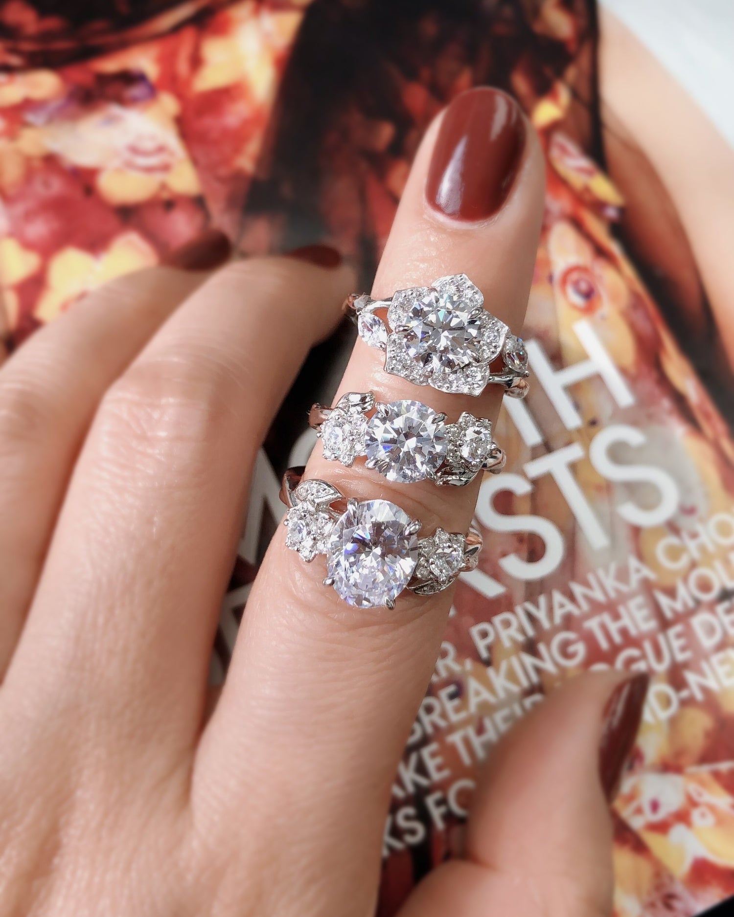 Model Wearing 3-Stone Ring, Flower Ring