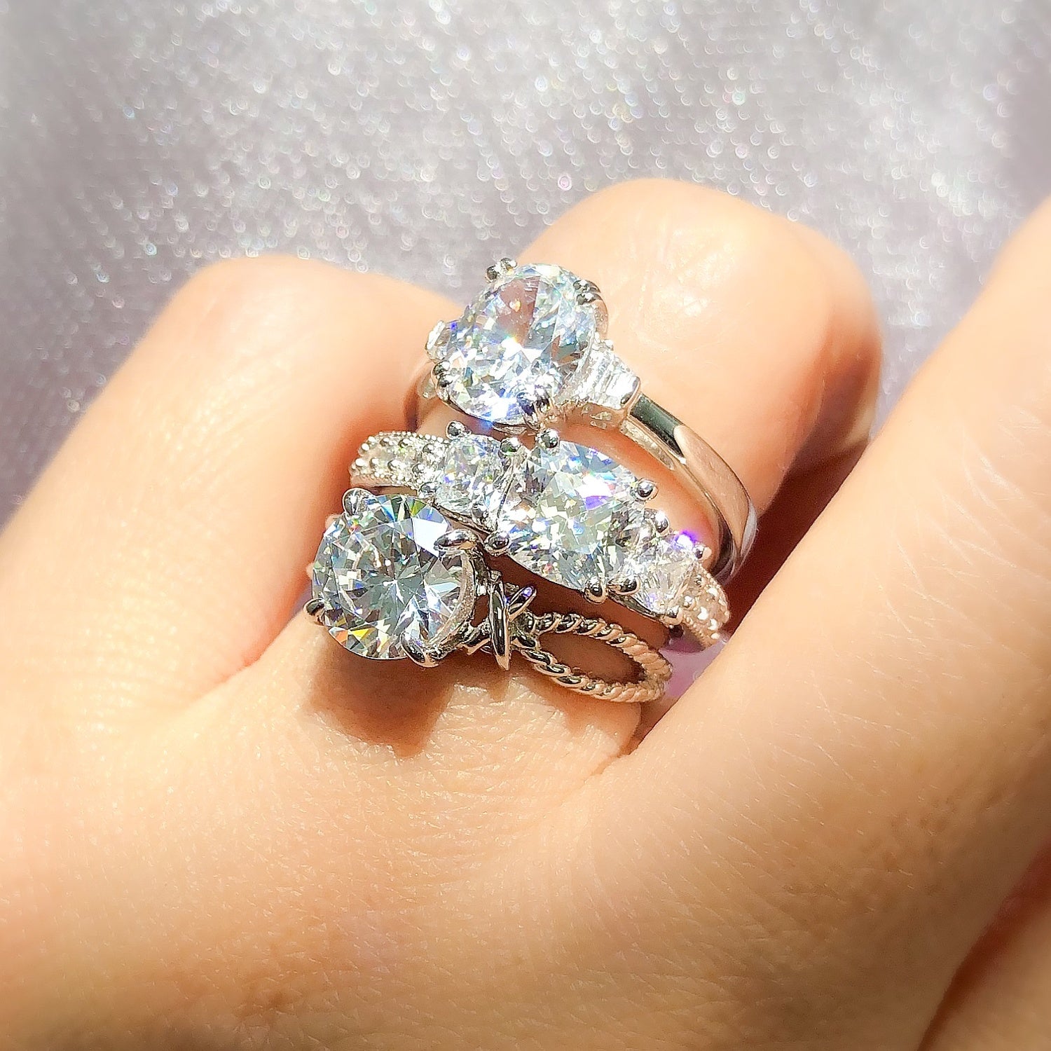 Model Wearing 3-Stone Ring, Cable Ring