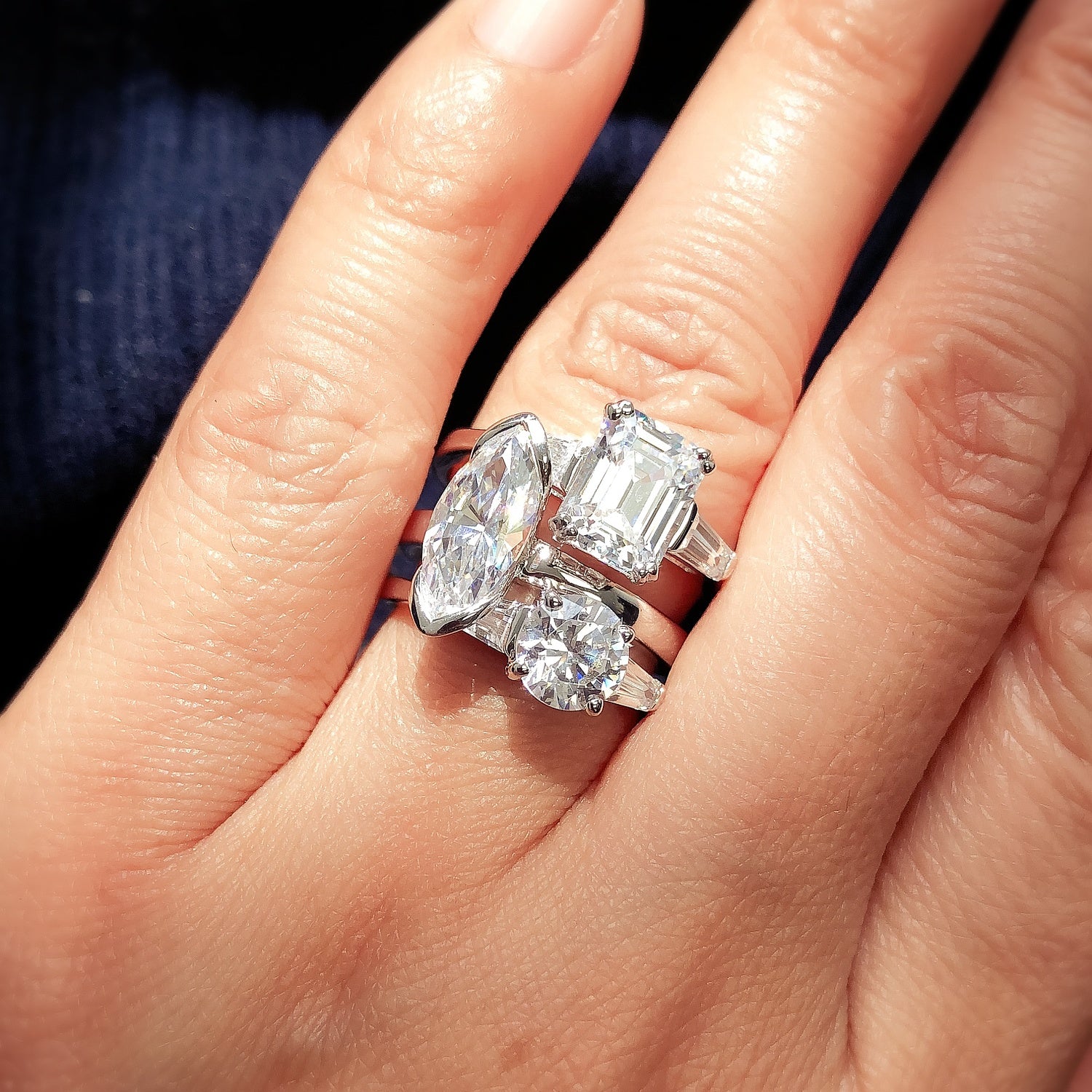 Model Wearing 3-Stone Ring, Solitaire Ring, Solitaire with Side Stones Ring