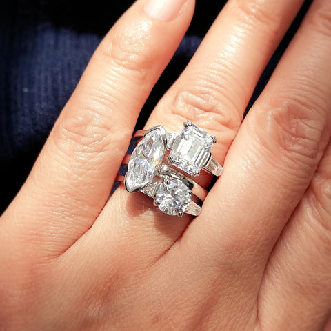 Model Wearing 3-Stone Ring, Solitaire Ring, Solitaire with Side Stones Ring