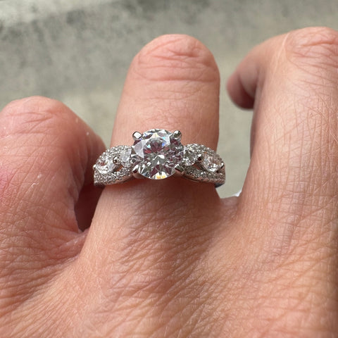 Model Wearing Solitaire with Side Stones Ring