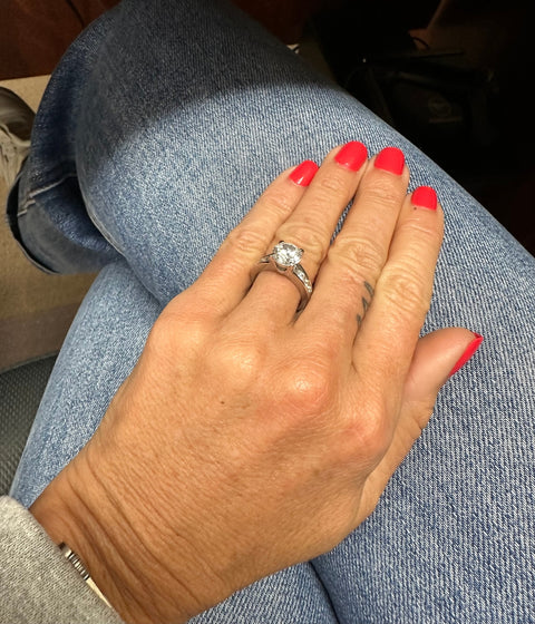 Model Wearing Solitaire with Side Stones Ring