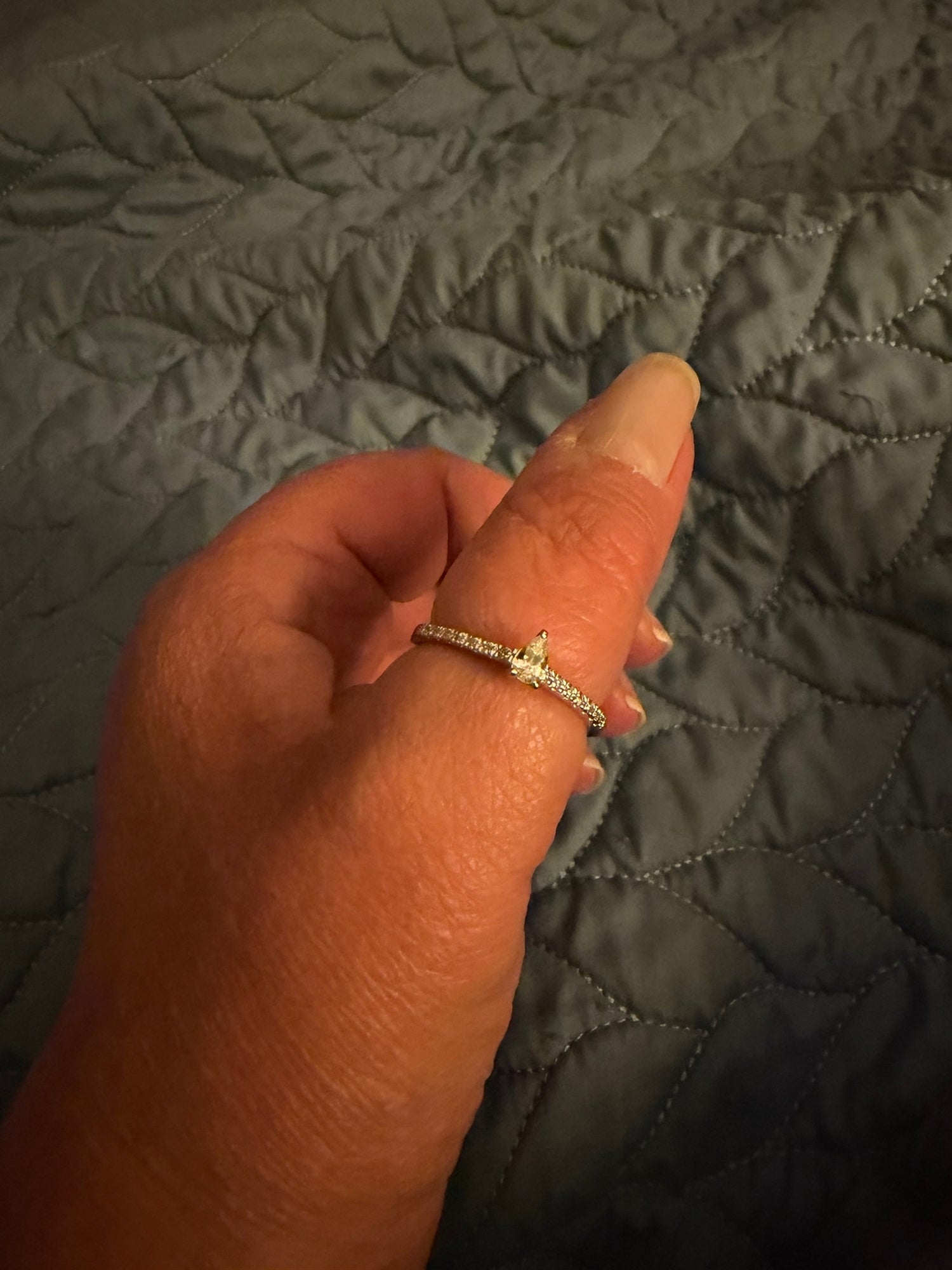 Model Wearing Solitaire with Side Stones Ring
