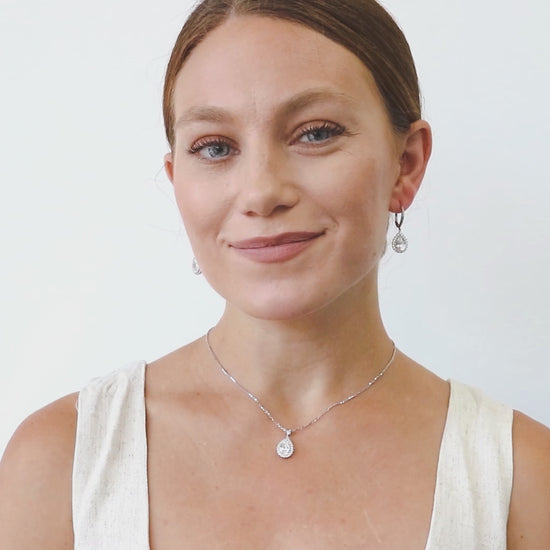 Video Contains Halo Pear CZ Leverback Dangle Earrings in Sterling Silver. Style Number E1059-01