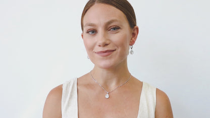 Video Contains Halo Pear CZ Leverback Dangle Earrings in Sterling Silver. Style Number E1059-01