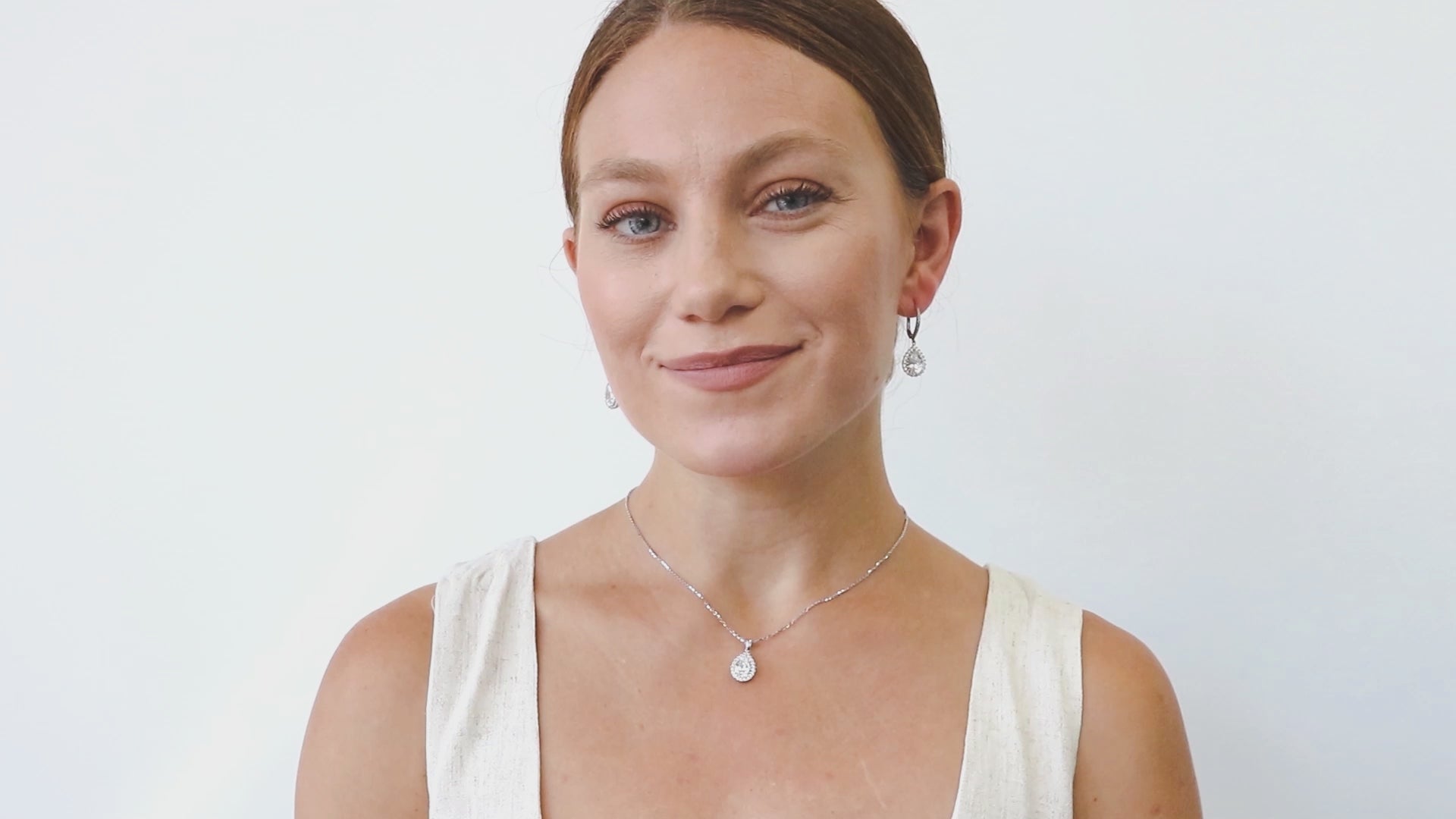 Video Contains Halo Pear CZ Leverback Dangle Earrings in Sterling Silver. Style Number E1059-01