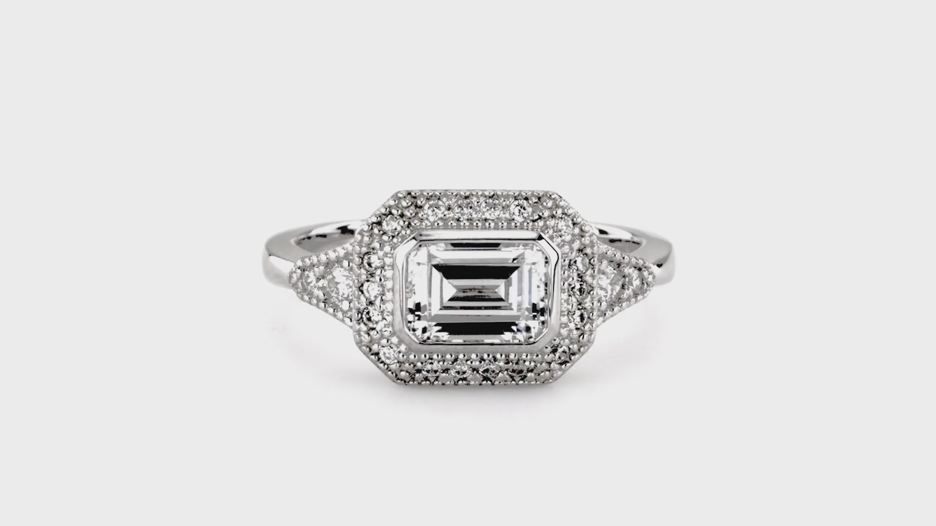 Video Contains Halo East-West Emerald Cut CZ Ring in Sterling Silver. Style Number R1496-01
