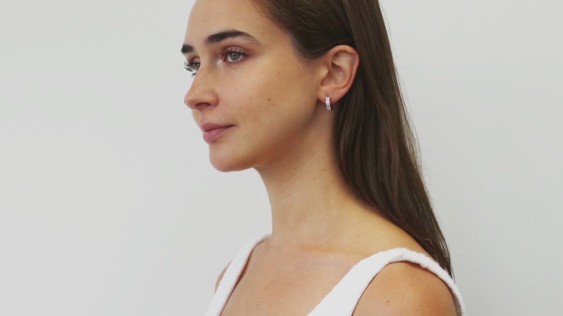 Video Contains Double Row CZ Medium Hoop Earrings in Sterling Silver 0.6". Style Number E1512-01