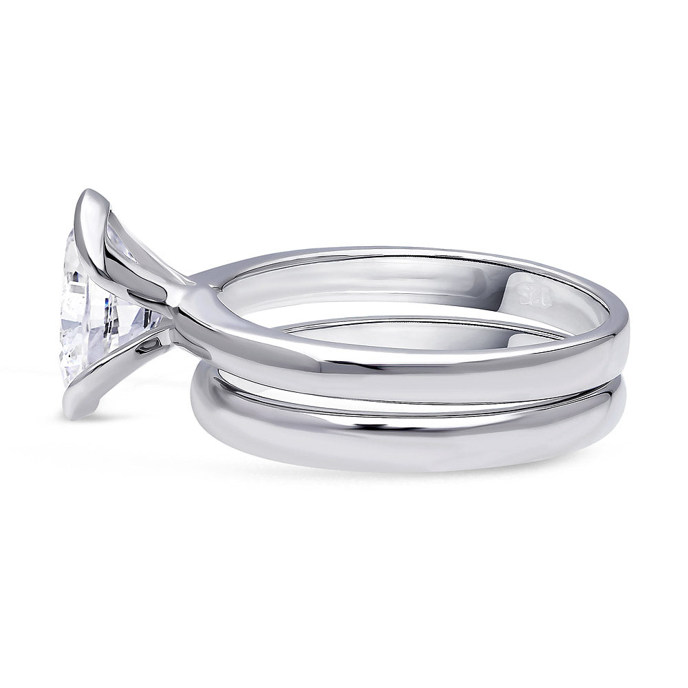 Angle view of Solitaire 1.8ct Bezel Oval CZ Ring Set in Sterling Silver, 3 of 7