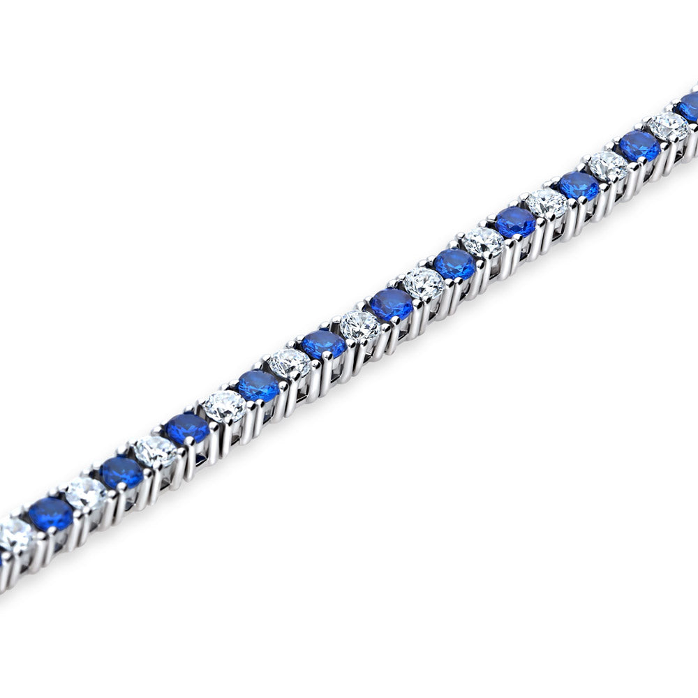 Angle view of Simulated Blue Sapphire CZ Statement Tennis Bracelet in Sterling Silver, 4 of 6