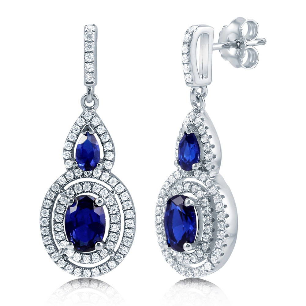 Halo Simulated Blue Sapphire Oval CZ Dangle Earrings in Sterling Silver, 1 of 3