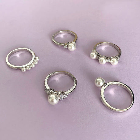 Image Contain: 5-Stone Band, Ball Bead Ring, Solitaire Ring, Solitaire with Side Stones Ring