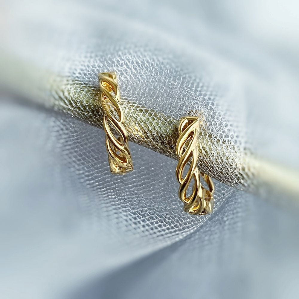 Flatlay view of Woven Small Hoop Earrings in Sterling Silver 0.7 inch, Yellow Gold Flashed