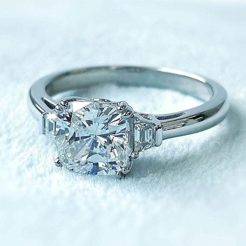 Flatlay view of 3-Stone 2ct Cushion CZ Ring in Sterling Silver, 9 of 10