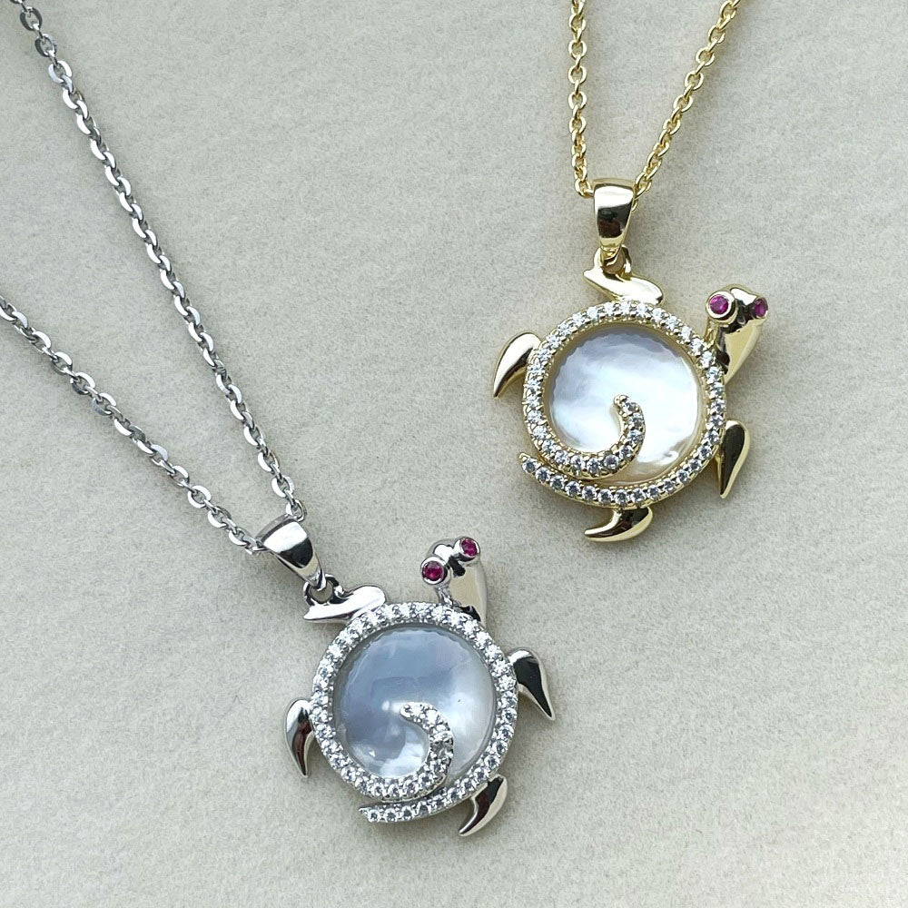 Flatlay view of Turtle Mother Of Pearl Pendant Necklace in Gold Flashed Sterling Silver, 3 of 6