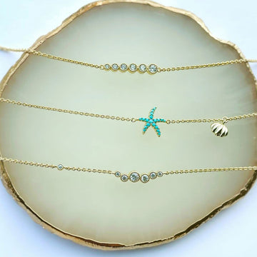 Starfish Clam Synthetic Turquoise Chain Bracelet in Sterling Silver