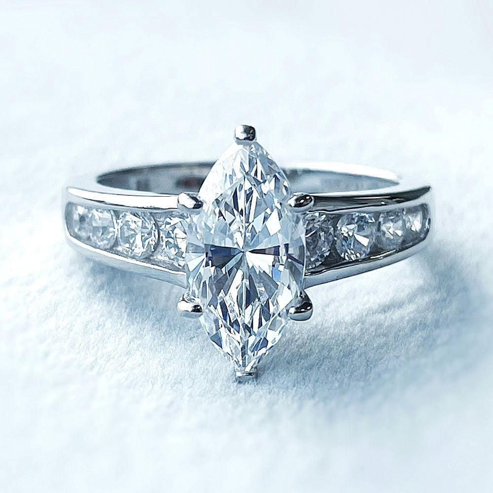 Flatlay view of Solitaire 1.6ct Marquise CZ Ring in Sterling Silver, 10 of 11