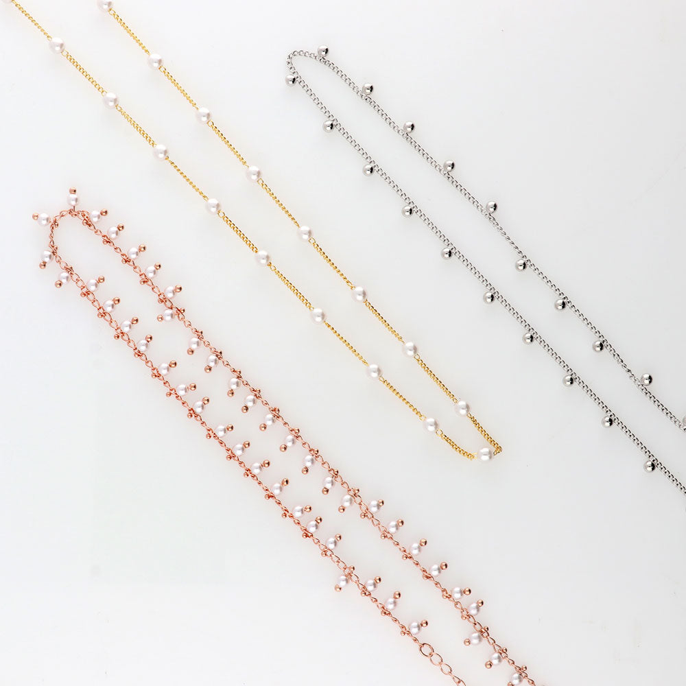Flatlay view of Imitation Pearl Station Necklace, Rose Gold Flashed