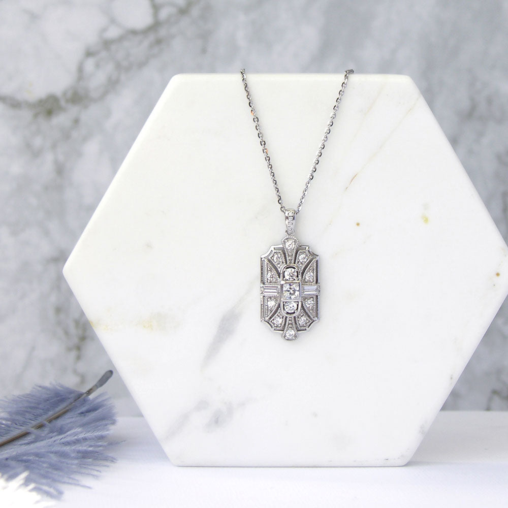 Flatlay view of Art Deco Milgrain CZ Necklace and Earrings Set in Sterling Silver, 5 of 13