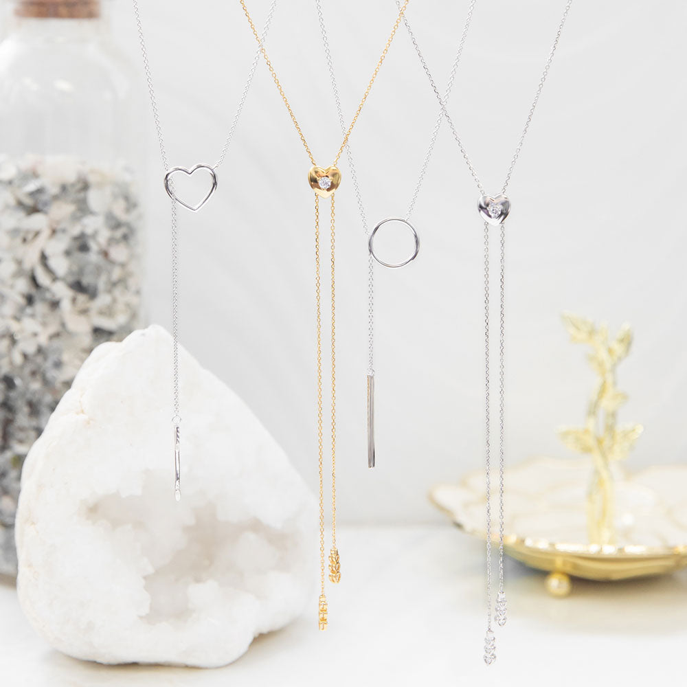 Flatlay view of Open Circle Bar Lariat Necklace in Sterling Silver, 3 of 6