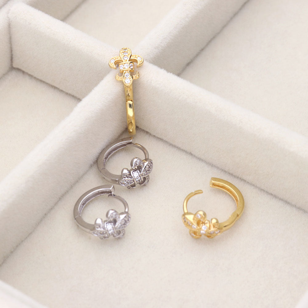 Image Contain: Fleur De Lis Huggie Earrings