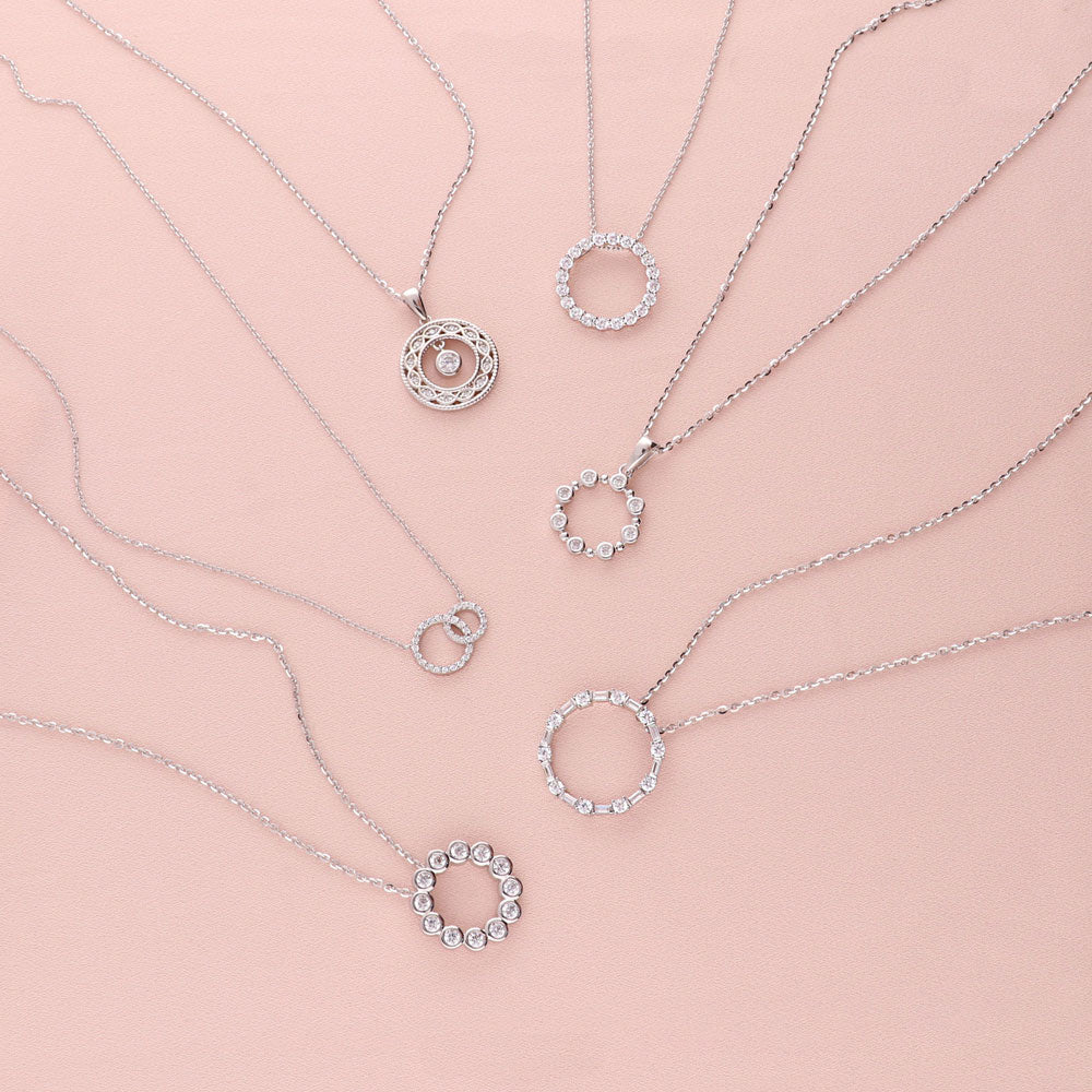 Flatlay view of Open Circle Interlocking CZ Necklace in Sterling Silver, 6 of 8