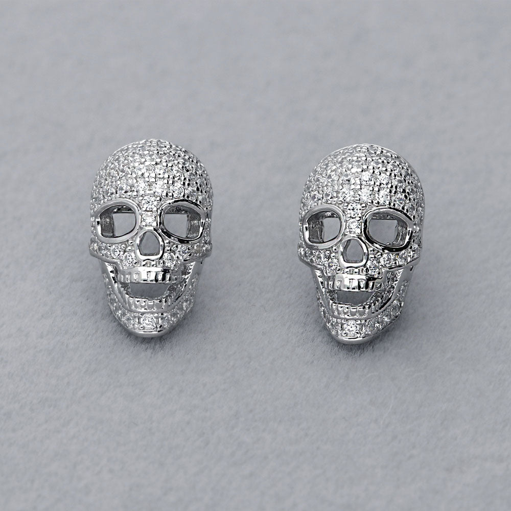 Flatlay view of Skull Bones CZ Stud Earrings in Sterling Silver, 2 of 7