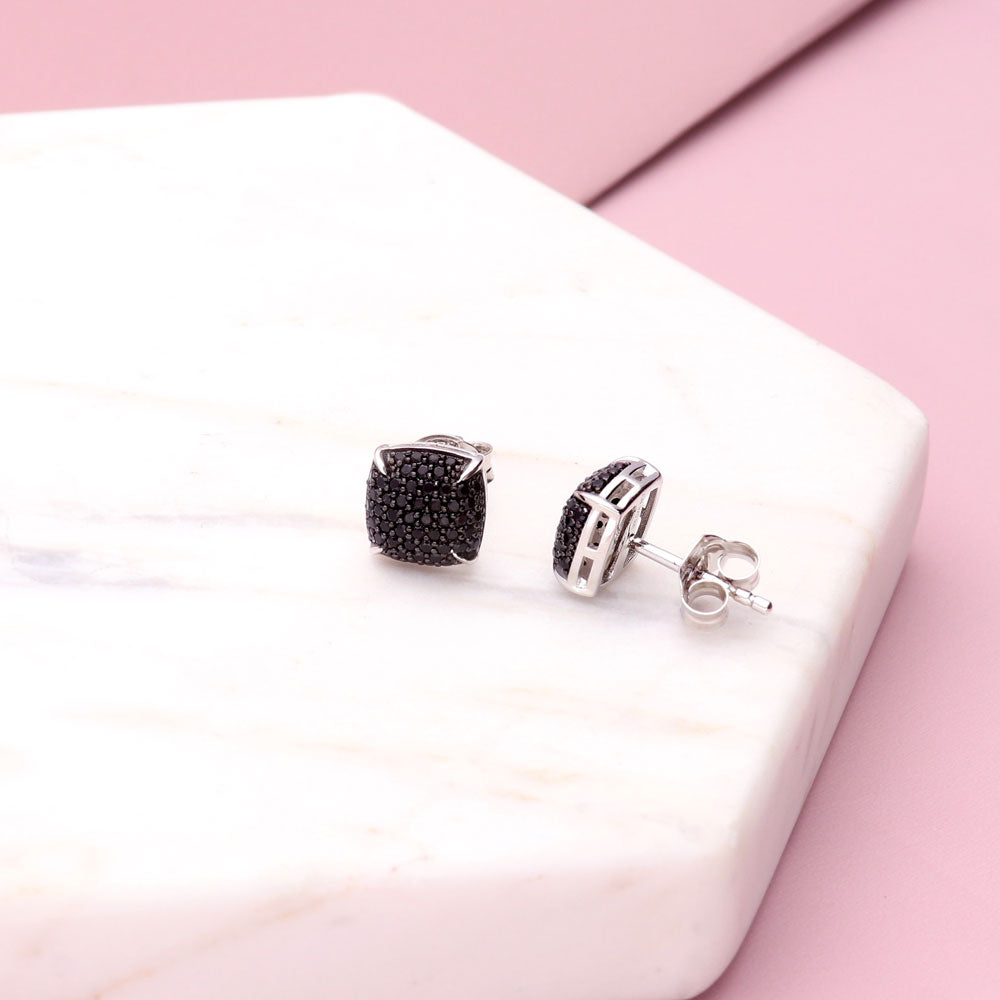 Flatlay view of Square CZ Stud Earrings in Sterling Silver, Black Color