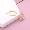 Flatlay view of Hexagon CZ Small Inside-Out Hoop Earrings in Sterling Silver 0.8 inch, Yellow Gold Flashed