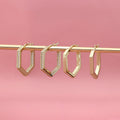 Flatlay view of Hexagon CZ Small Inside-Out Hoop Earrings in Sterling Silver 0.8 inch, Yellow Gold Flashed