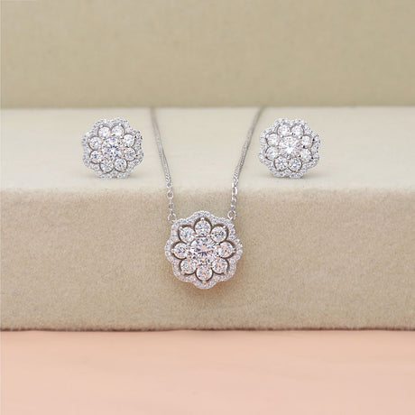 Image Contain: Flower Pendant Necklace, Flower Stud Earrings
