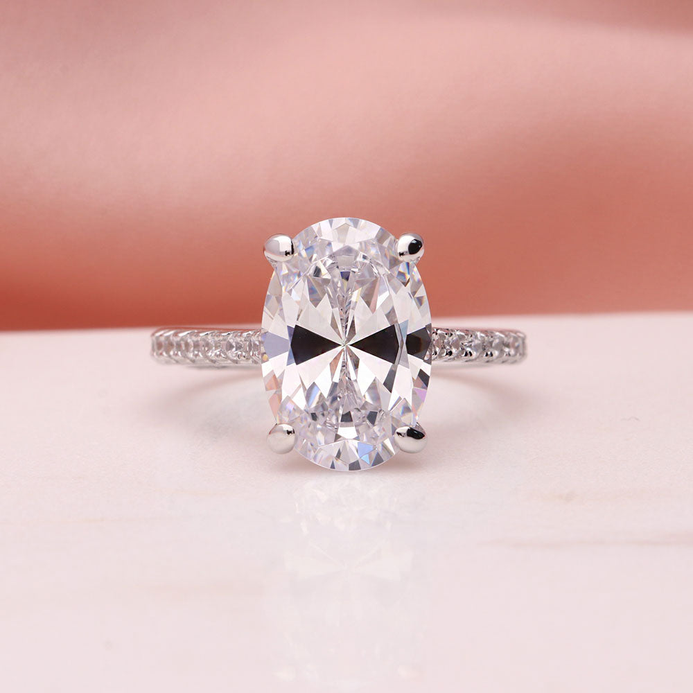 Flatlay view of Solitaire 5.5ct Oval CZ Ring in Sterling Silver, 9 of 11
