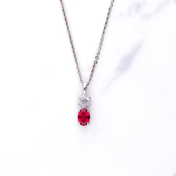 Flower Simulated Ruby CZ Pendant Necklace in Sterling Silver