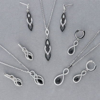 Image Contain: Black and White Dangle Earrings, Black and White Pendant Necklace