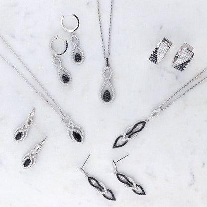 Image Contain: Black and White Dangle Earrings, Black and White Huggie Earrings, Black and White Pendant Necklace