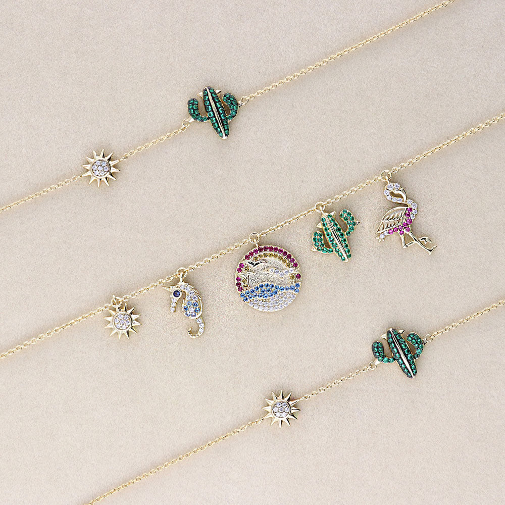 Flatlay view of Star Seahorse Flamingo Sun CZ Charm Bracelet in Sterling Silver, 2 of 3