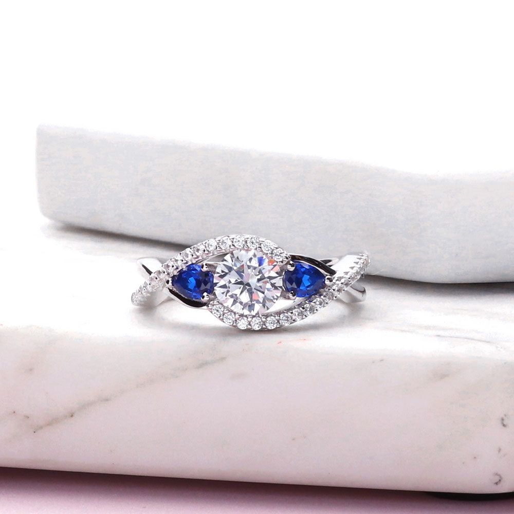 Flatlay view of 3-Stone Woven Bypass 0.8ct CZ Ring in Sterling Silver, 7 of 10