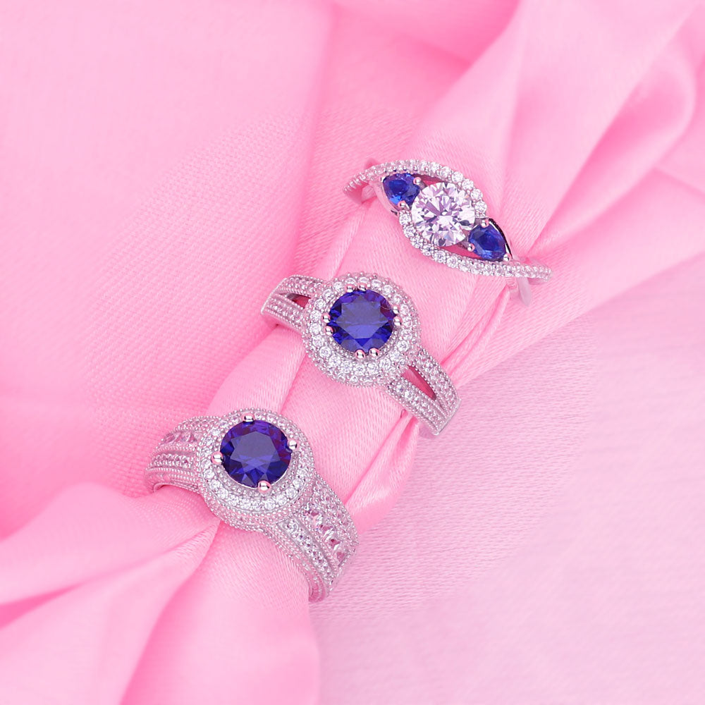 Flatlay view of 3-Stone Woven Bypass 0.8ct CZ Ring in Sterling Silver, 9 of 10
