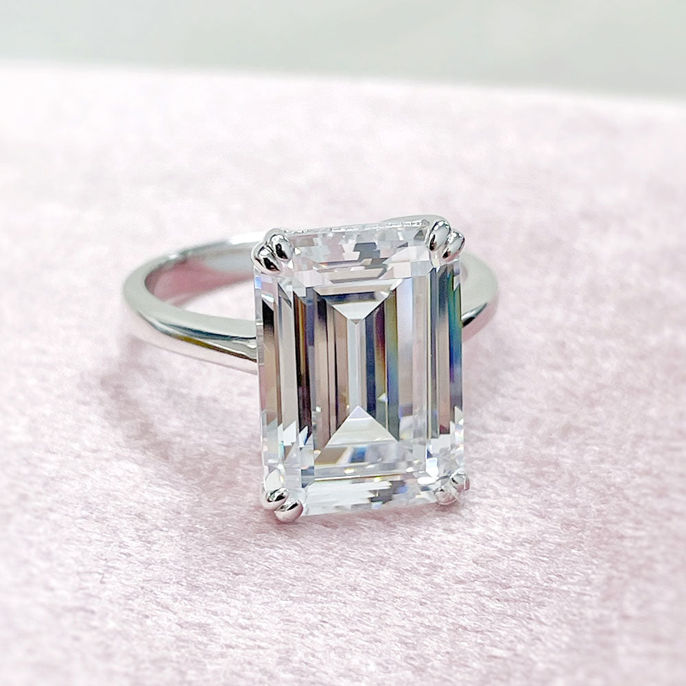 Flatlay view of Solitaire 8.5ct Emerald Cut CZ Ring in Sterling Silver, 10 of 11