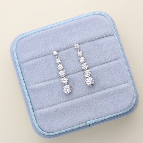 Image Contain: Graduated Dangle Earrings