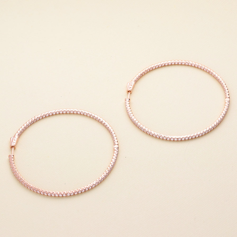 Flatlay view of CZ Large Inside-Out Hoop Earrings in Sterling Silver 2.5 inch, Rose Gold Flashed