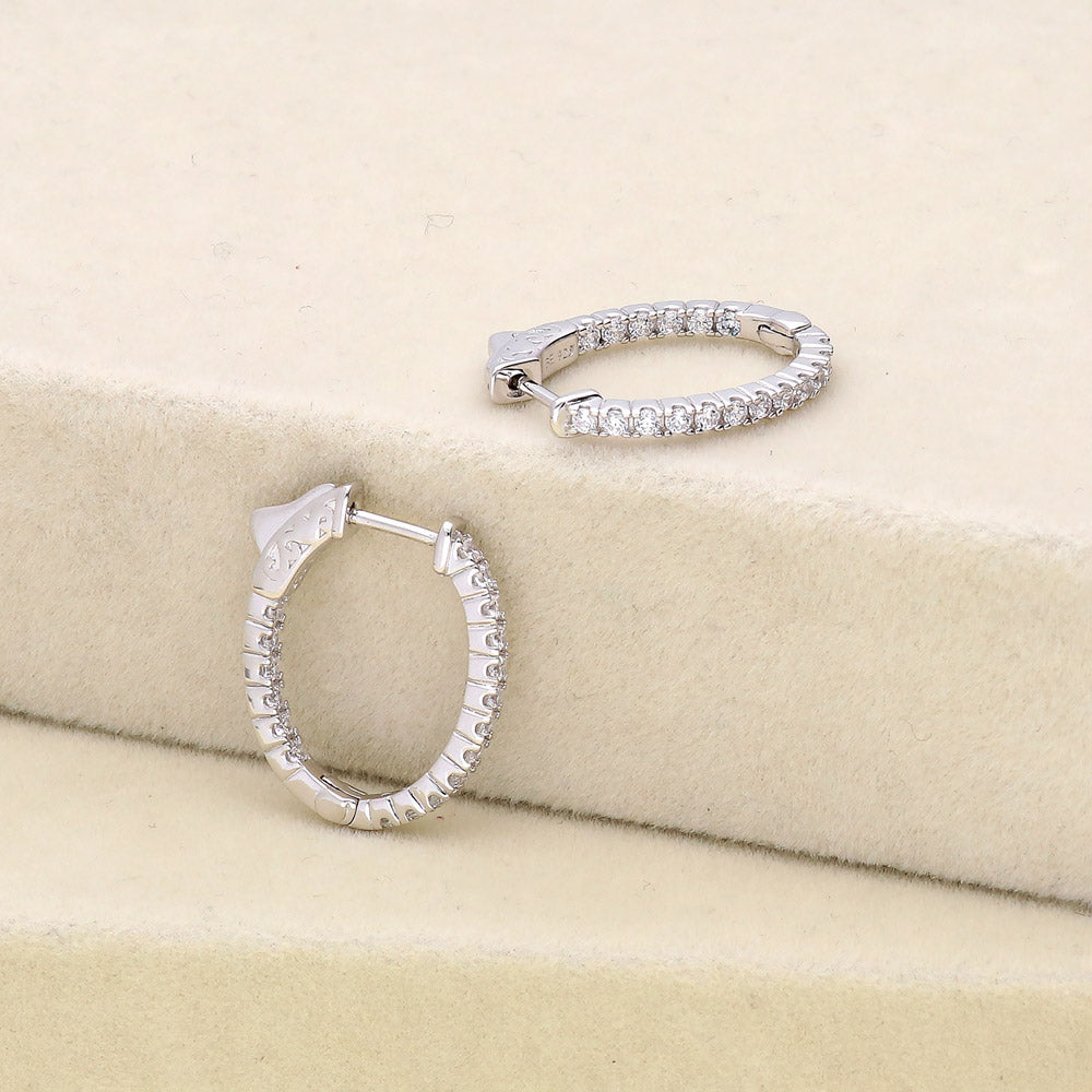 Flatlay view of Oval CZ Small Inside-Out Hoop Earrings in Sterling Silver 0.8 inch, Rhodium Plated